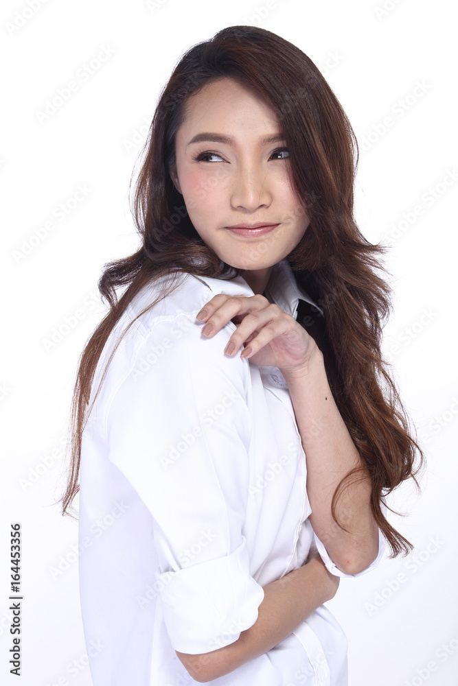 Perfect Healthy Female Model with Natural Beauty Clean Look Fashion Make Up style in White Shirt, long hair, White Background in Studio Lighting, the concept of health, smile Face Perfect Healthy Female Model with Natural Beauty Clean Look Fashion Make Up style in White Shirt, long hair, White Background in Studio Lighting, the concept of health, smile Face