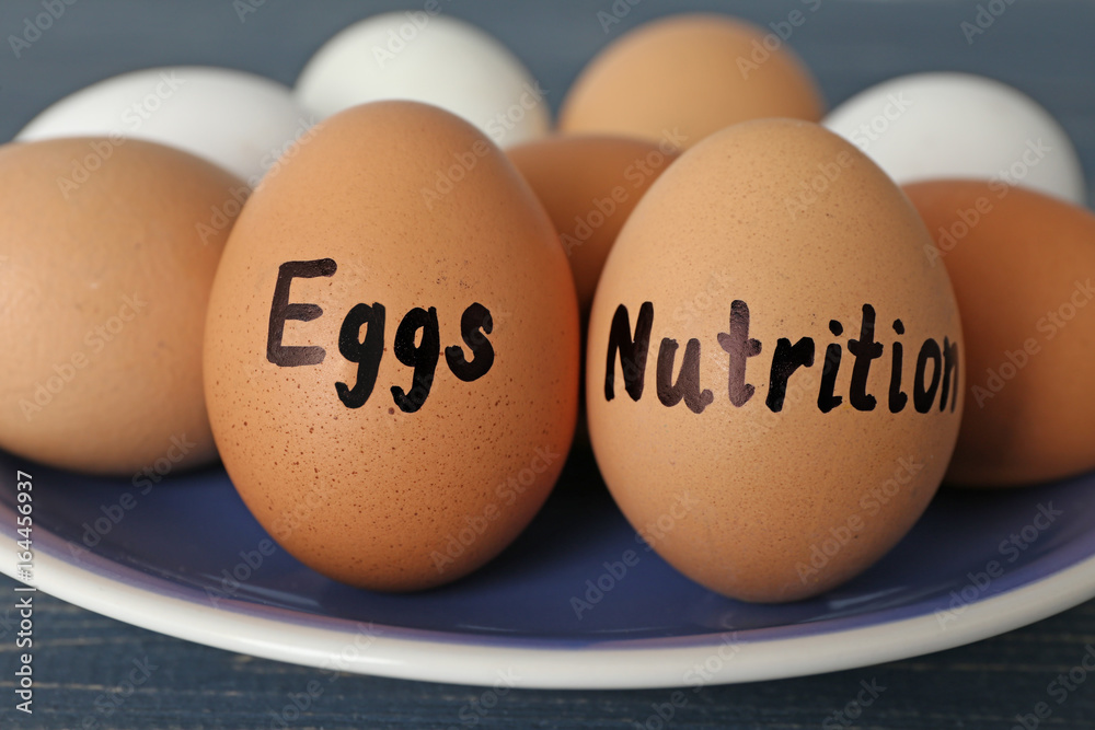 Plate with eggs on table. Nutrition concept Plate with eggs on table. Nutrition concept