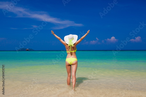 Thailand. Woman sea, bikini, hat, back. Sea background