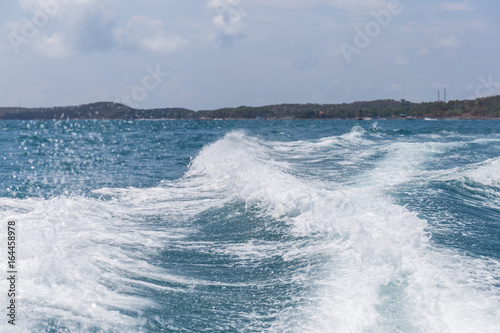 Sea waves caused by speedboats engine. © nengredeye