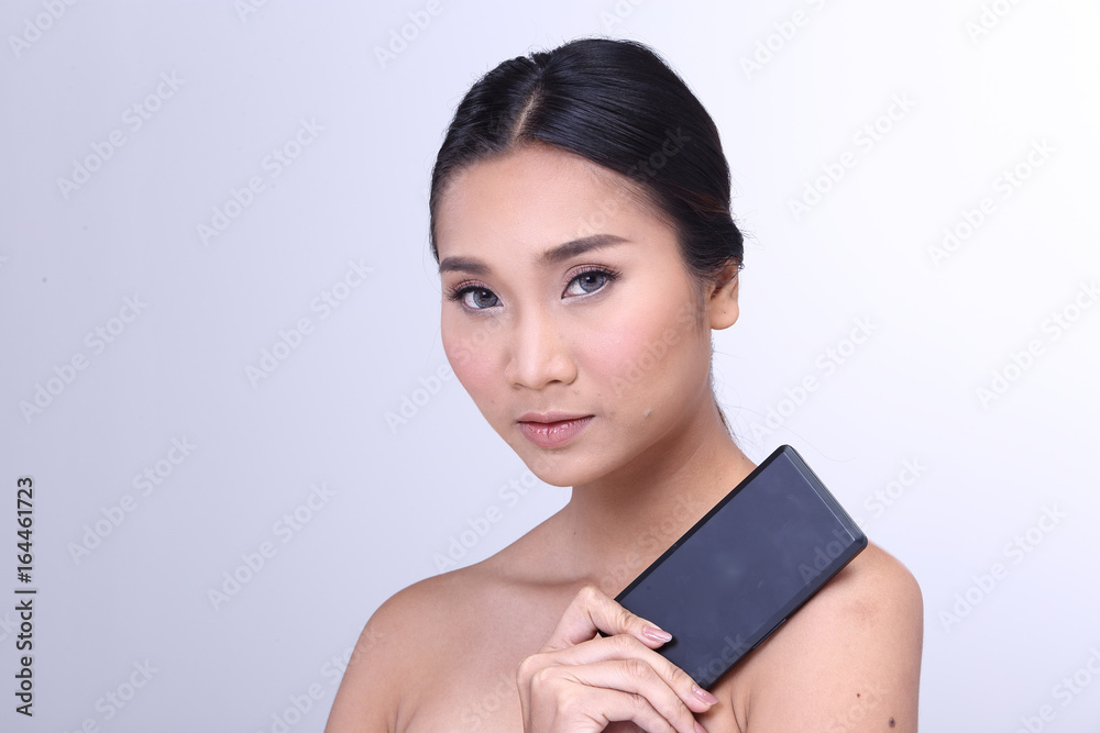 Cosmetic, Applying Make up, Beauty Process, white studio background, Perfect Healthy Skin, Black matte powder box palette Cosmetic, Applying Make up, Beauty Process, white studio background, Perfect Healthy Skin, Black matte powder box palette