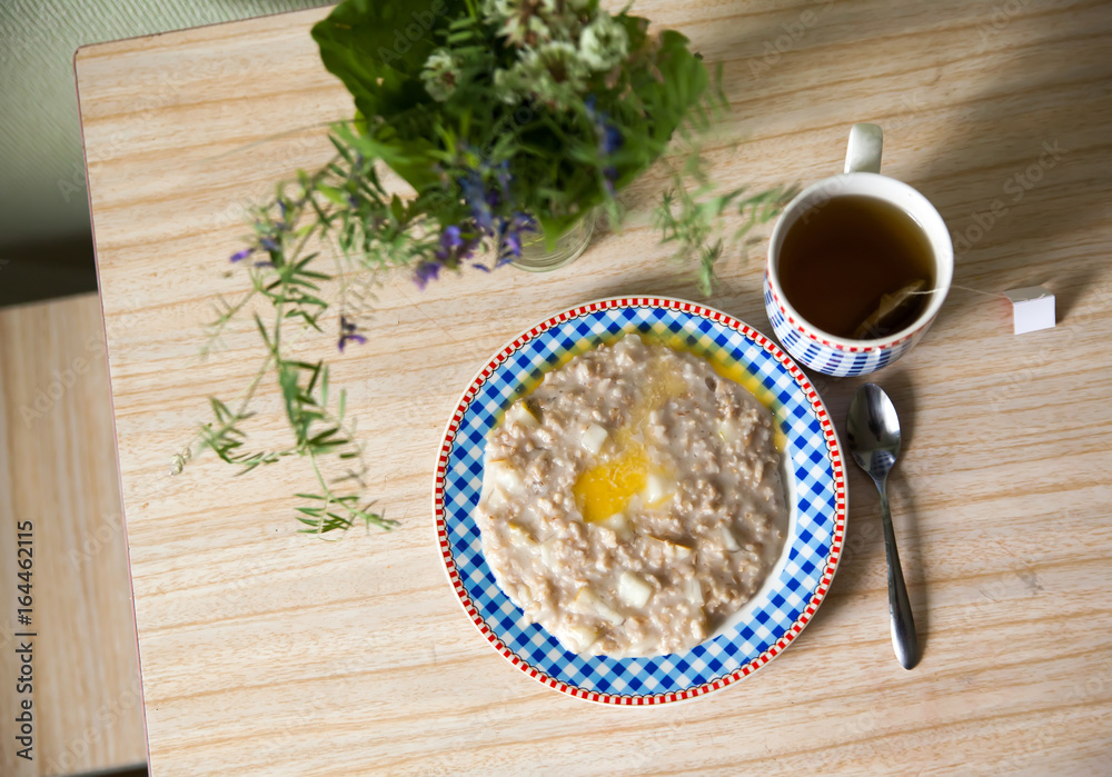 plate of porridge with butter plate of porridge with butter
