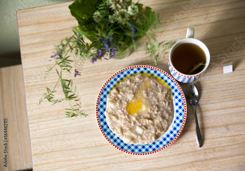 plate of porridge with butter