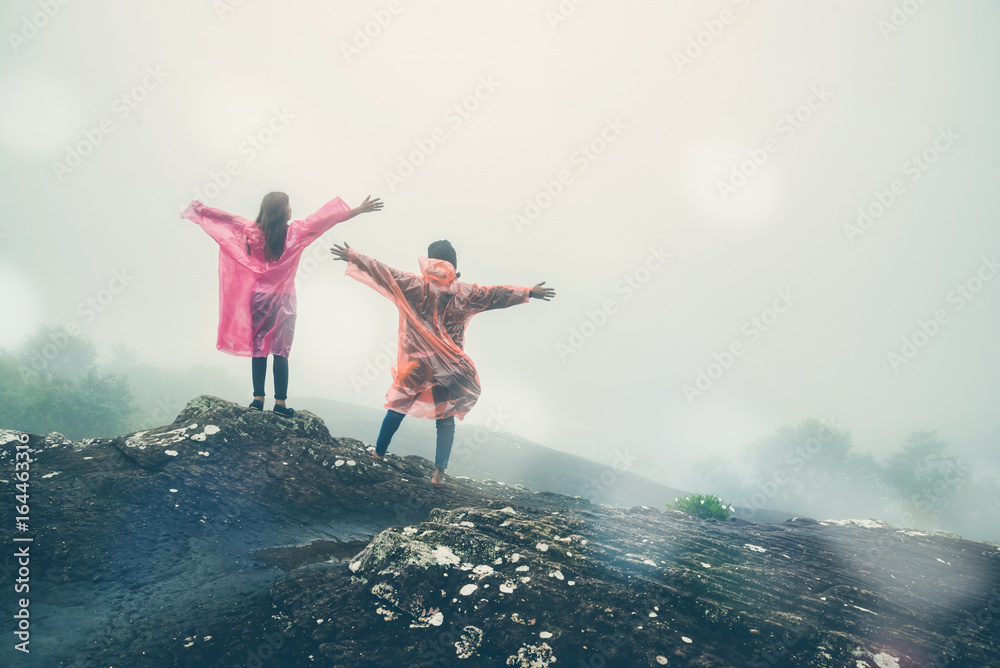 Lover Men and women Asia travel relax. walk in the forest Lover Men and women Asia travel relax. walk in the forest