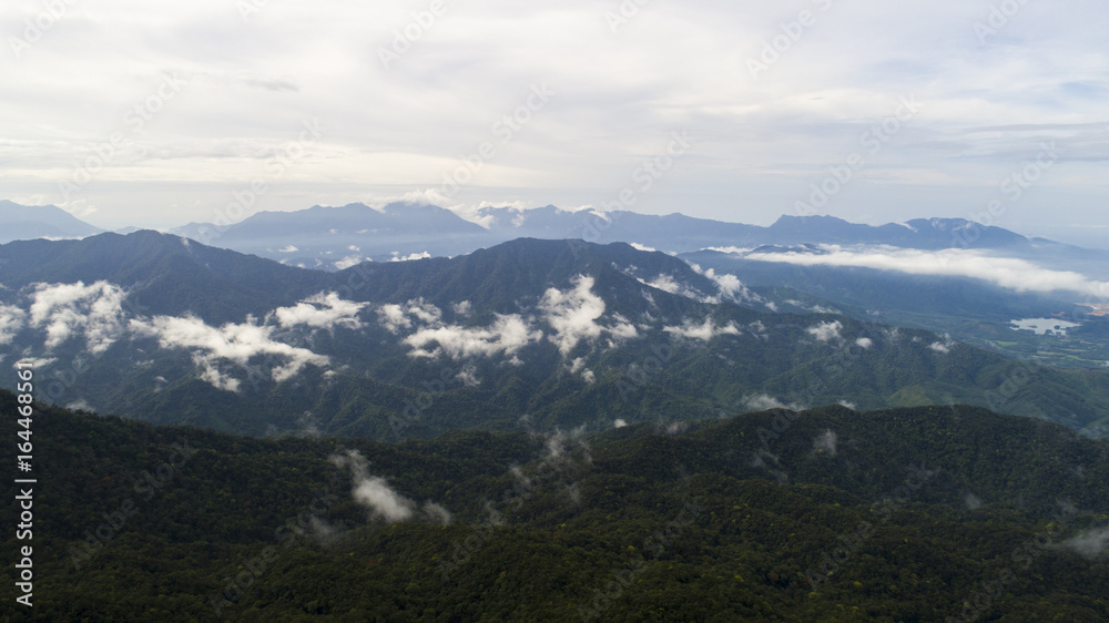 Mountains from the high Mountains from the high covered by evening clouds.