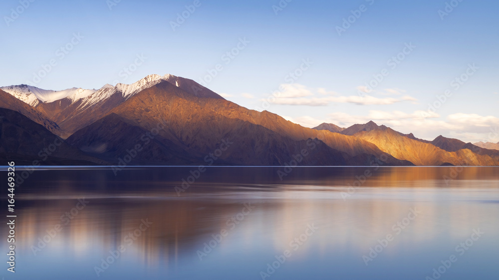 The reflection of mountain and a sunset at Pangong Lake, Leh Ladakh, India
