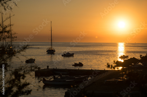 sea sunset with boats