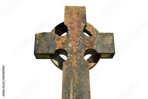 Old Celtic cross found in an old graveyard cut out and isolated on a white background 