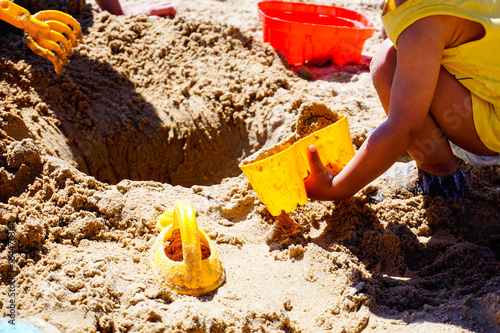 Childs are playing game at the beach