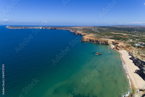 Wallpaper Mural Aerial view of the Tonel Beach (Praia do Tonel) with the Saint Vincent Cape (Cabo de Sao Vincente) on the background, in Algarve, Portugal Torontodigital.ca