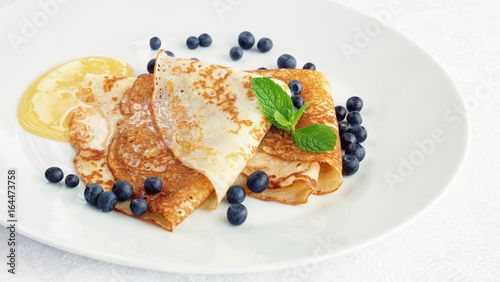 dessert crepes with honey and bilberry 