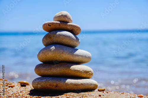 beach stone balancing