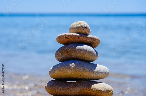 beach stone balancing
