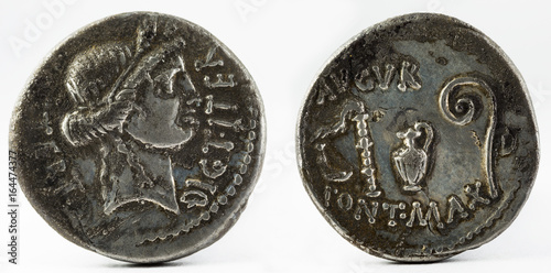 Roman Republic Coin. Ancient Roman silver denarius of Julius Caesar. photo