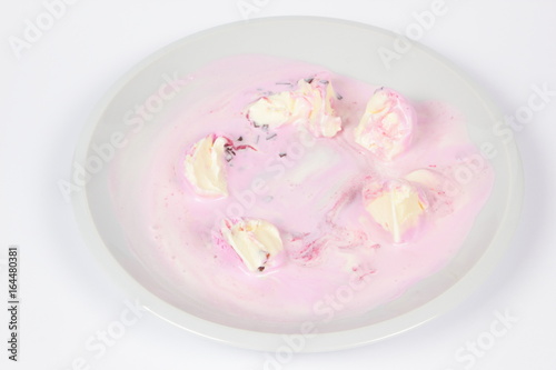 Ice cream in a white plate for a child
