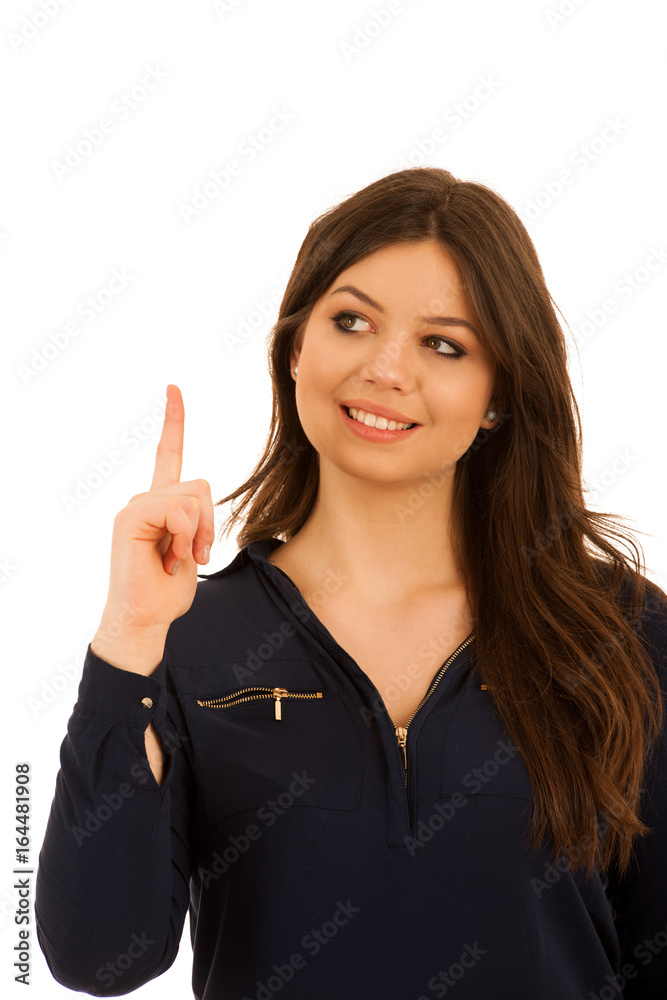 attractive young woman pointing to copy space isolated over white background attractive young woman pointing to copy space isolated over white background