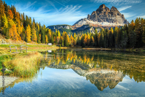 Beautiful alpine lake with high peaks in background, Dolomites, Italy