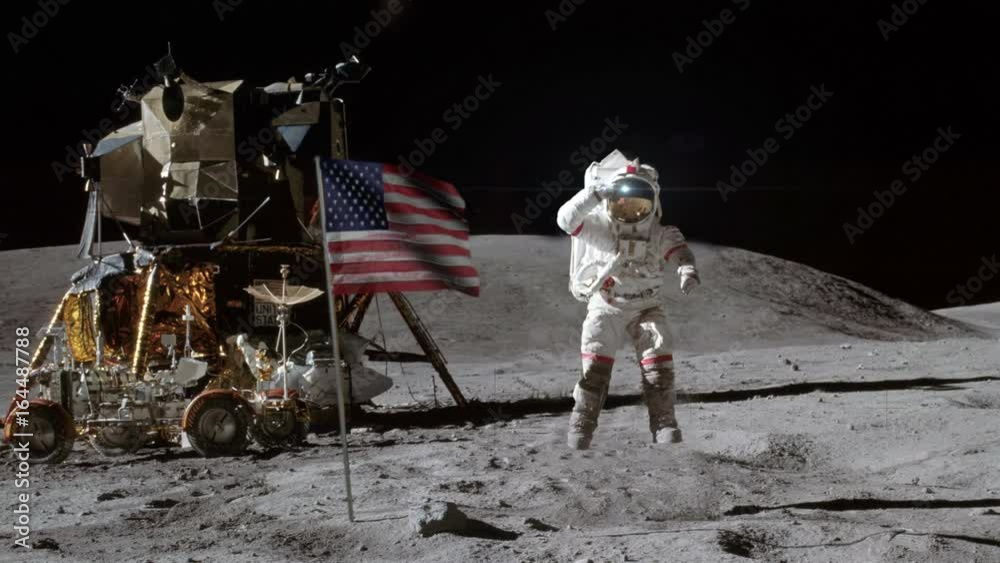 Astronaut standing beside an American flag on the surface of the moon.