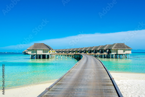 Wooden villas over water of the Indian Ocean, Maldives © Myroslava
