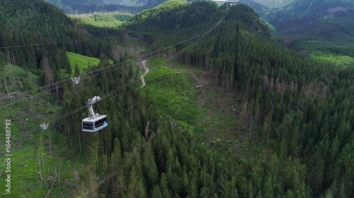 fligh over cableway in mountains