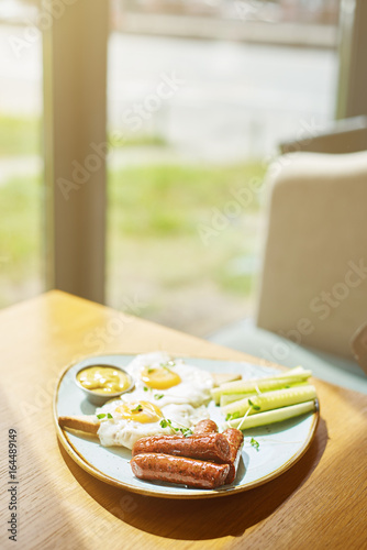 food background of hotel breakfast of eggs and sousages photo