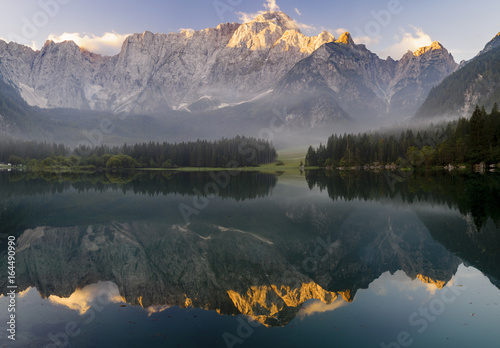 Fototapeta Naklejka Na Ścianę i Meble -  Beautiful mountain lake Laghi Di Fusine in the morning