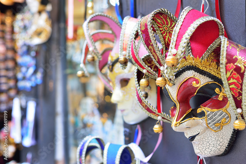Traditional venetian mask in store on street, Venice Italy.