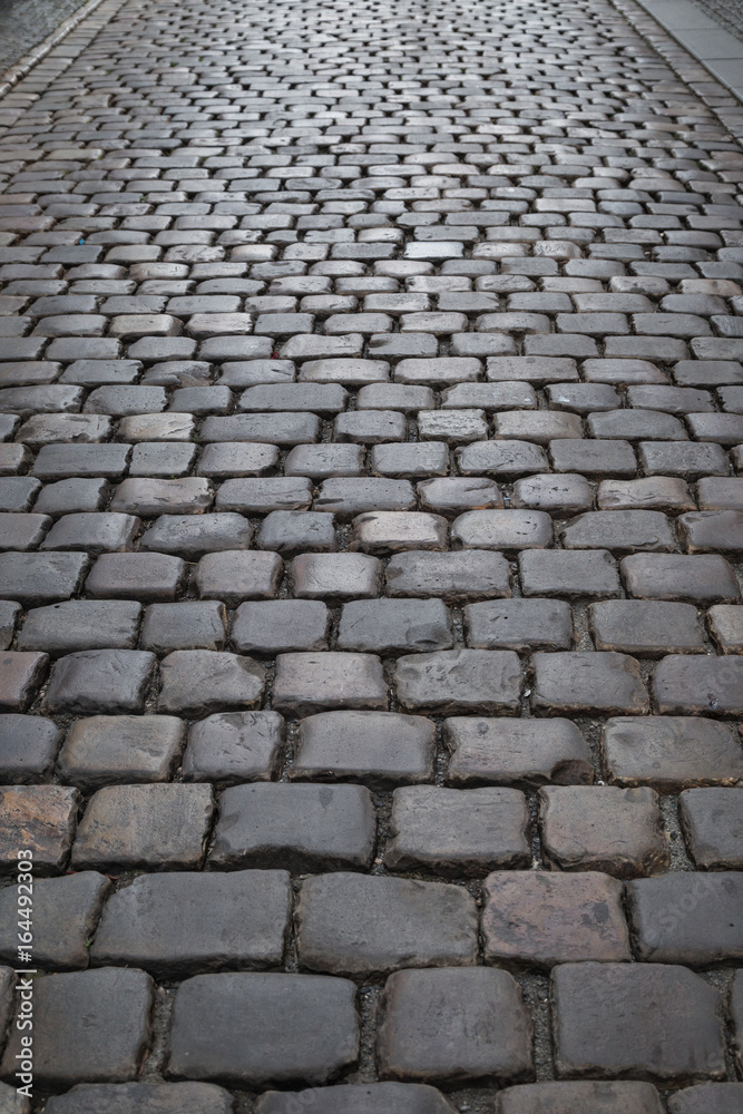 Old paving stone road at the Old Town in Prague, Czech Republic. Viewed from above.
