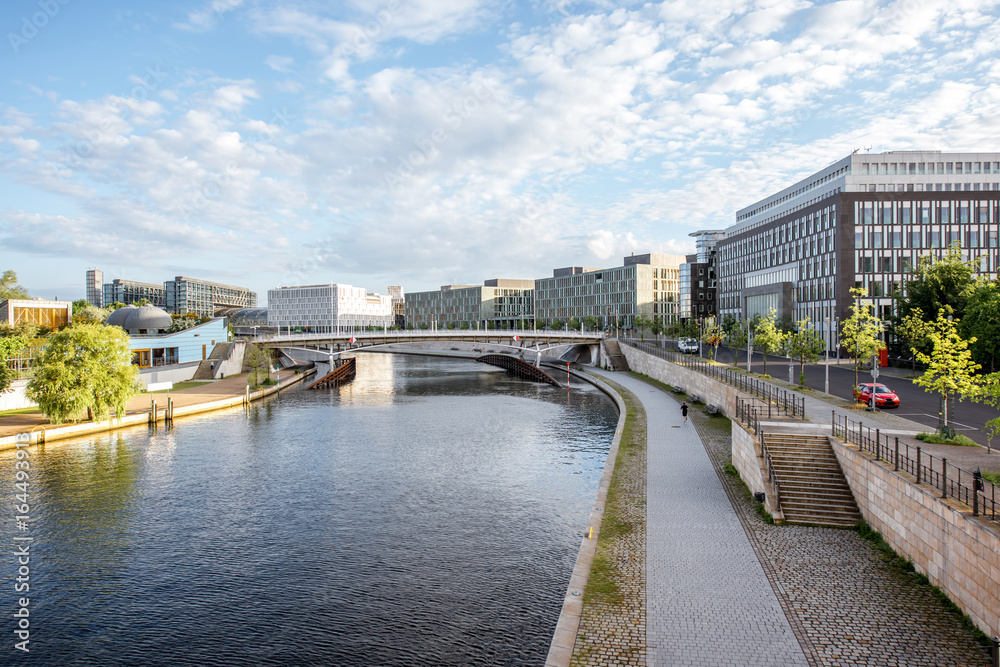 Morning cityscape view on the modern financial district with Spree river near the parliament building in Berlin city