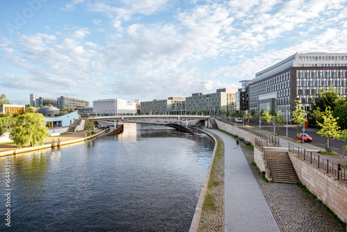 Morning cityscape view on the modern financial district with Spree river near the parliament building in Berlin city © rh2010