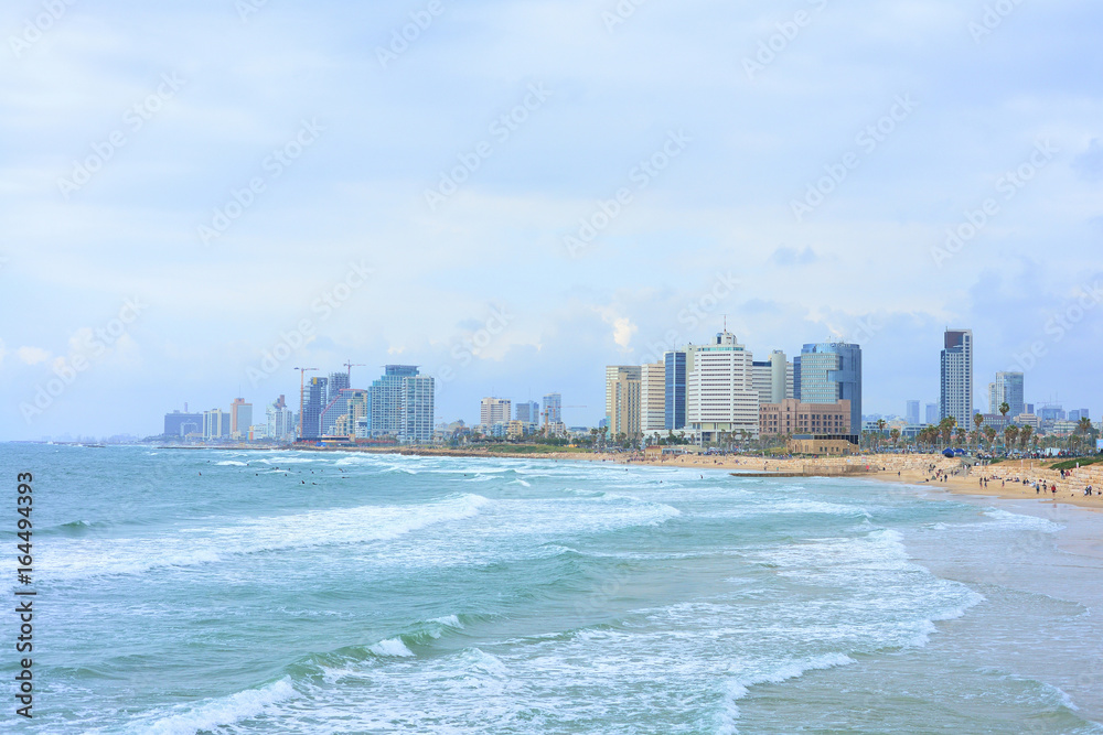 Naklejka premium TEL AVIV, ISRAEL - APRIL, 2017: View of the coastline of Tel Aviv in cloudy weather. Famous tourist view, overview