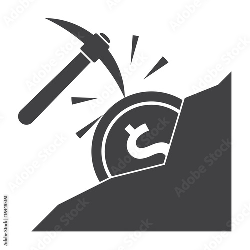 Making money concept with pickaxe and coin in mountain