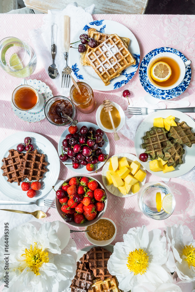 Table Set for Breakfast with Waffles and Berries