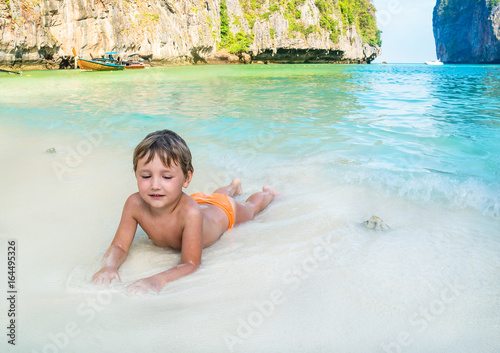 Boy in Phuket beach in Thailand