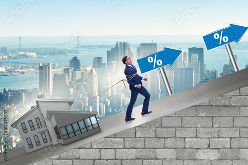 Businessman in mortgage debt financing concept