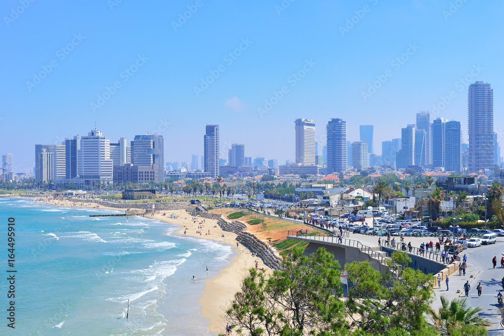 TEL AVIV, ISRAEL - APRIL, 2017: View of the coastline of Tel Aviv from the observation deck in old Jaffa. TEL AVIV, ISRAEL - APRIL, 2017: View of the coastline of Tel Aviv from the observation deck in old Jaffa.