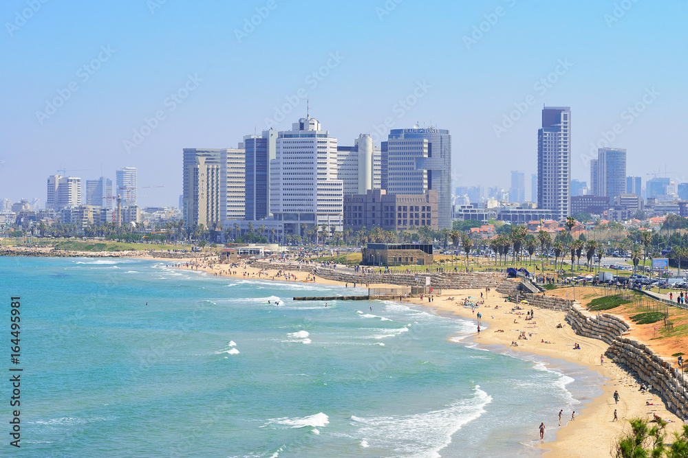 TEL AVIV, ISRAEL - APRIL, 2017: View of the coastline of Tel Aviv from the observation deck in old Jaffa. TEL AVIV, ISRAEL - APRIL, 2017: View of the coastline of Tel Aviv from the observation deck in old Jaffa.