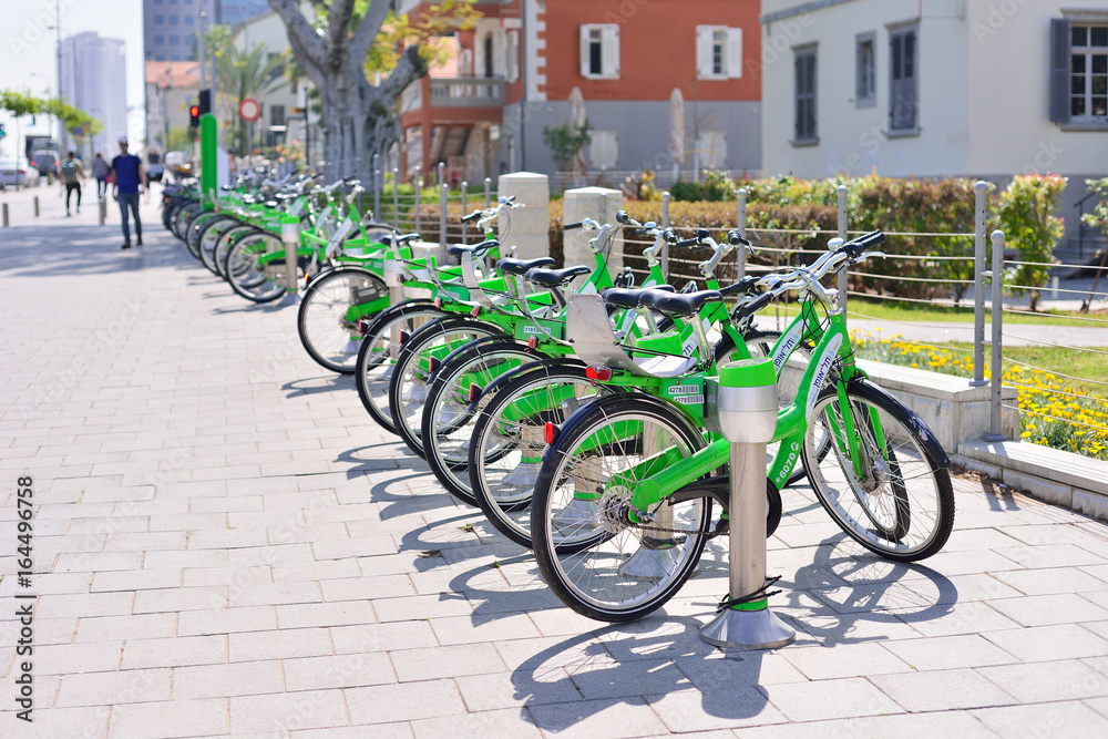 TEL AVIV, ISRAEL- APRIL, 2017: Parked bicycles in center of Tel Aviv.Tel-O-Fun is a bicycle sharing service which provided by the city including 125 active stations.