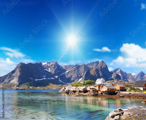 small town of hamnoy near lofoten in norway with blue sky photo