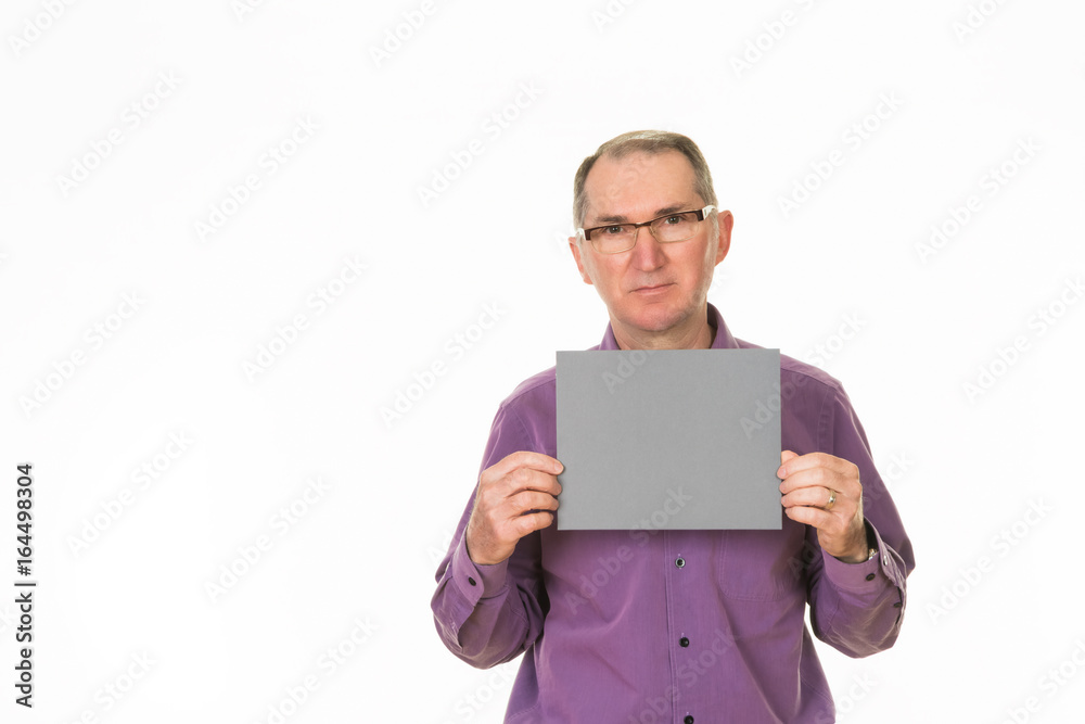 Senior men standing holding blank horizontal card Senior men standing holding blank horizontal card