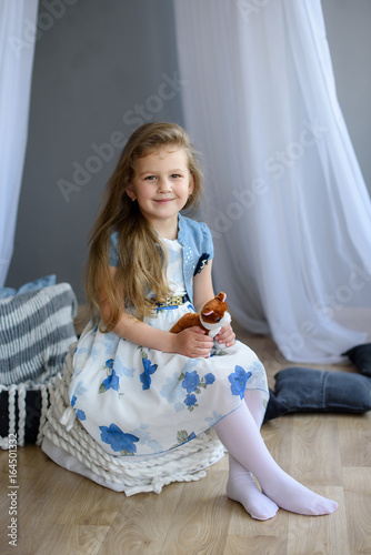 Happy Little child girl at home 