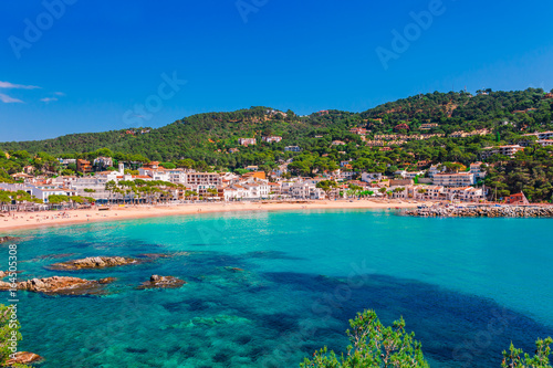 Sea landscape Llafranc near Calella de Palafrugell, Catalonia, Barcelona, Spain. Scenic old town with nice sand beach and clear blue water in bay. Famous tourist destination in Costa Brava © oleg_p_100
