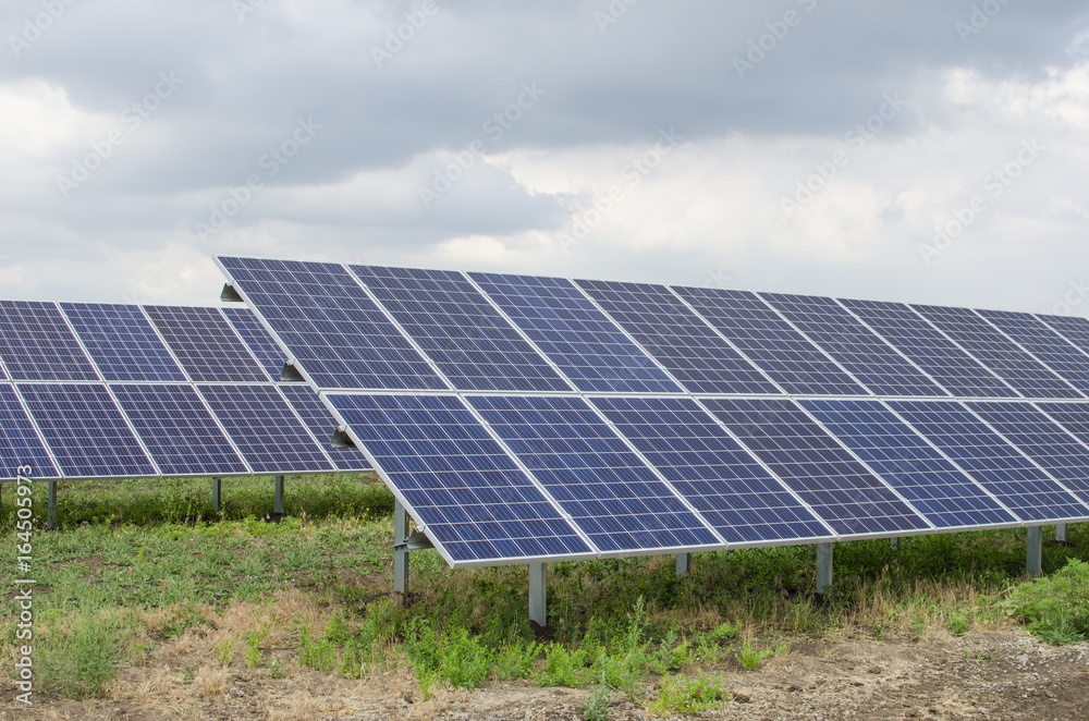 Solar panels on the sky background