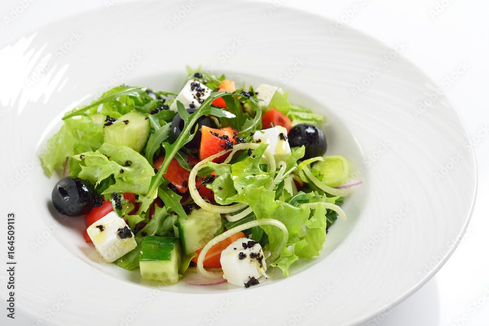 Fresh Greek salad, white background