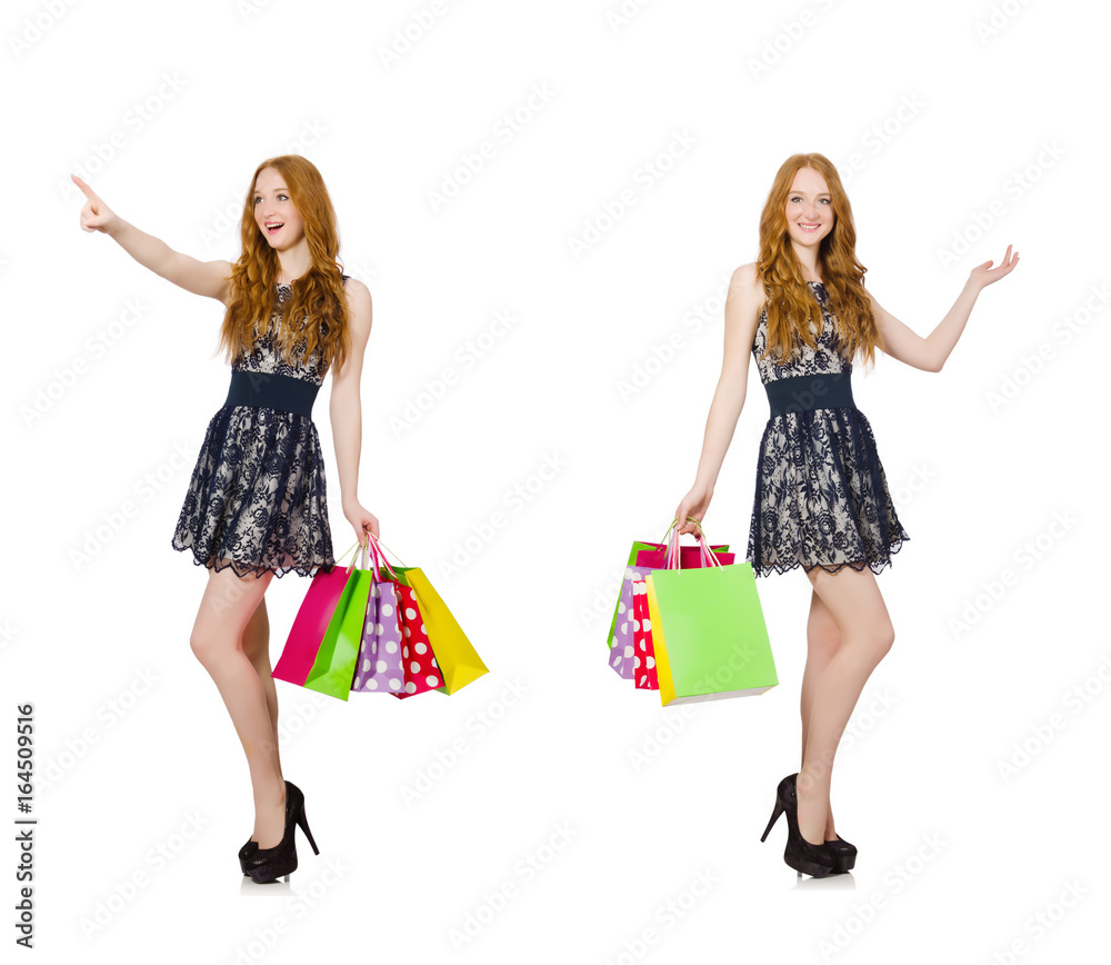 Woman with shopping bags isolated on white