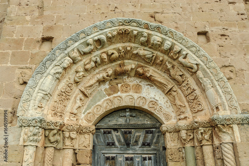 door of Romanesque church of Saint Andres in Soto of Bureba in the north of the province of Burgos, Spain
