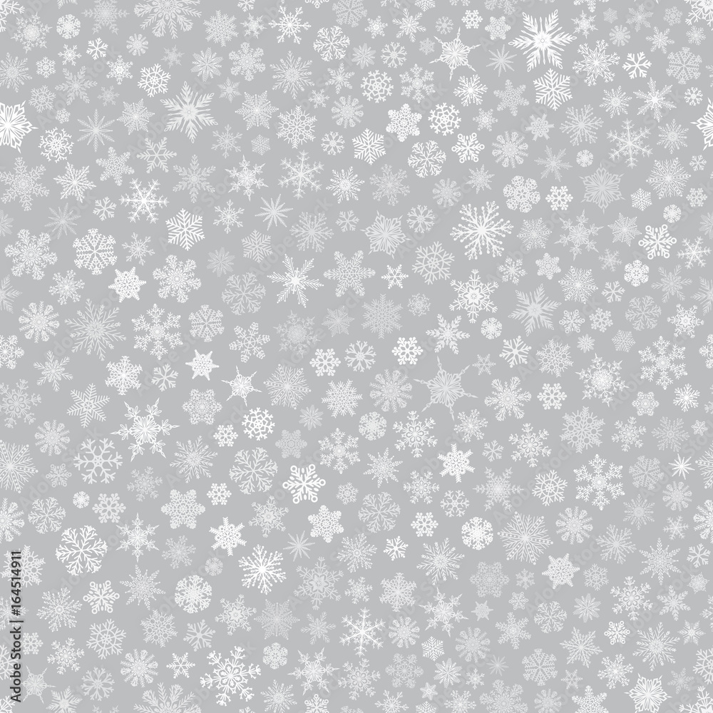 Seamless pattern of snowflakes, white on gray