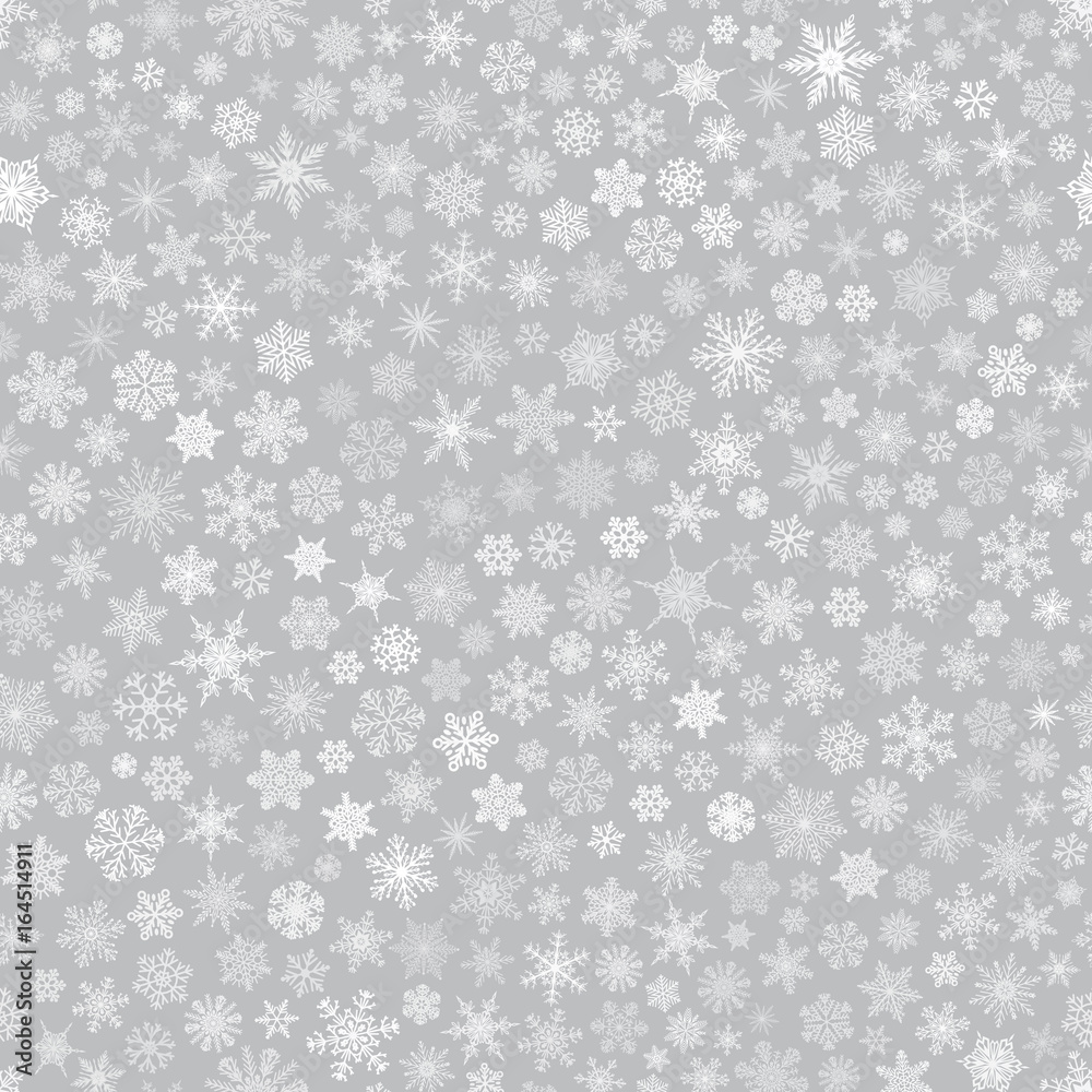 Fototapeta premium Seamless pattern of snowflakes, white on gray