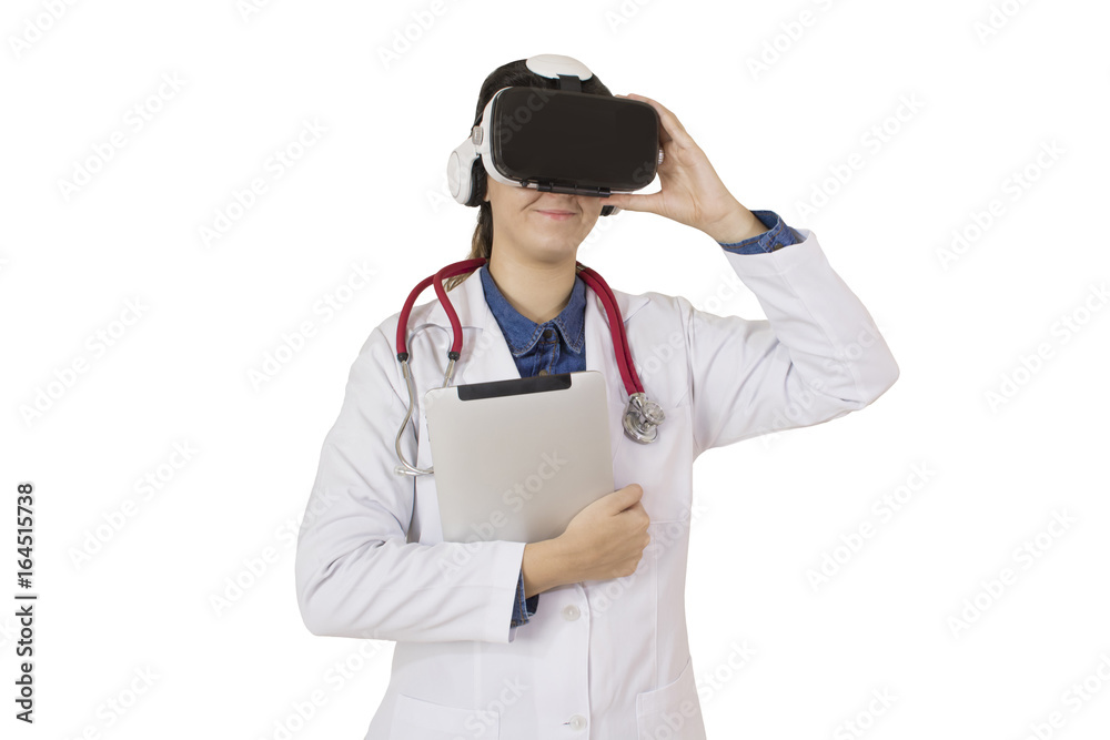 Woman doctor, veterinary or scientist with stethoscope using VR virtual reality glasses simulator isolated in white background Woman doctor, veterinary or scientist with stethoscope using VR virtual reality glasses simulator isolated in white background
