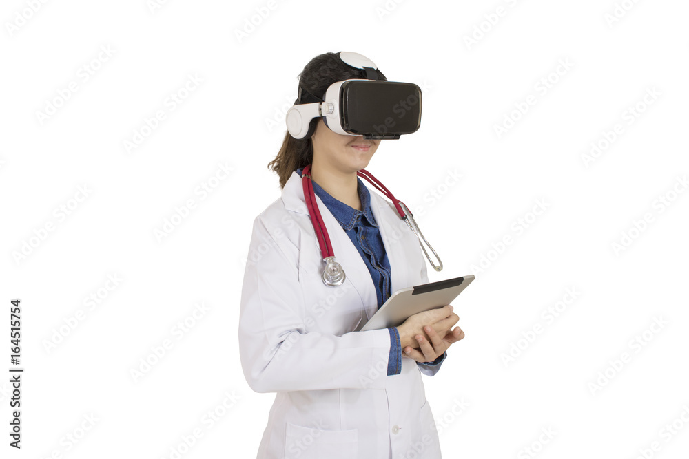 Woman doctor, veterinary or scientist with stethoscope using VR virtual reality glasses simulator isolated in white background Woman doctor, veterinary or scientist with stethoscope using VR virtual reality glasses simulator isolated in white background